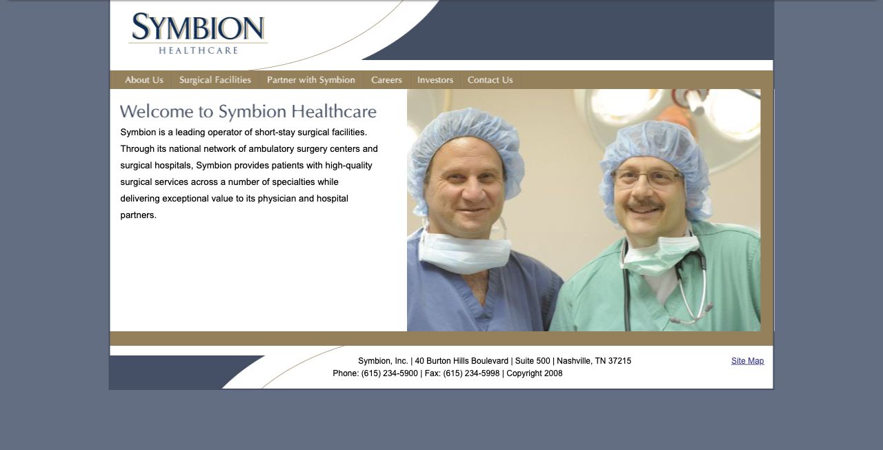 Earlier Symbion Healthcare desktop homepage with blue-and-gold branding, a corporate introduction, and surgical photography.